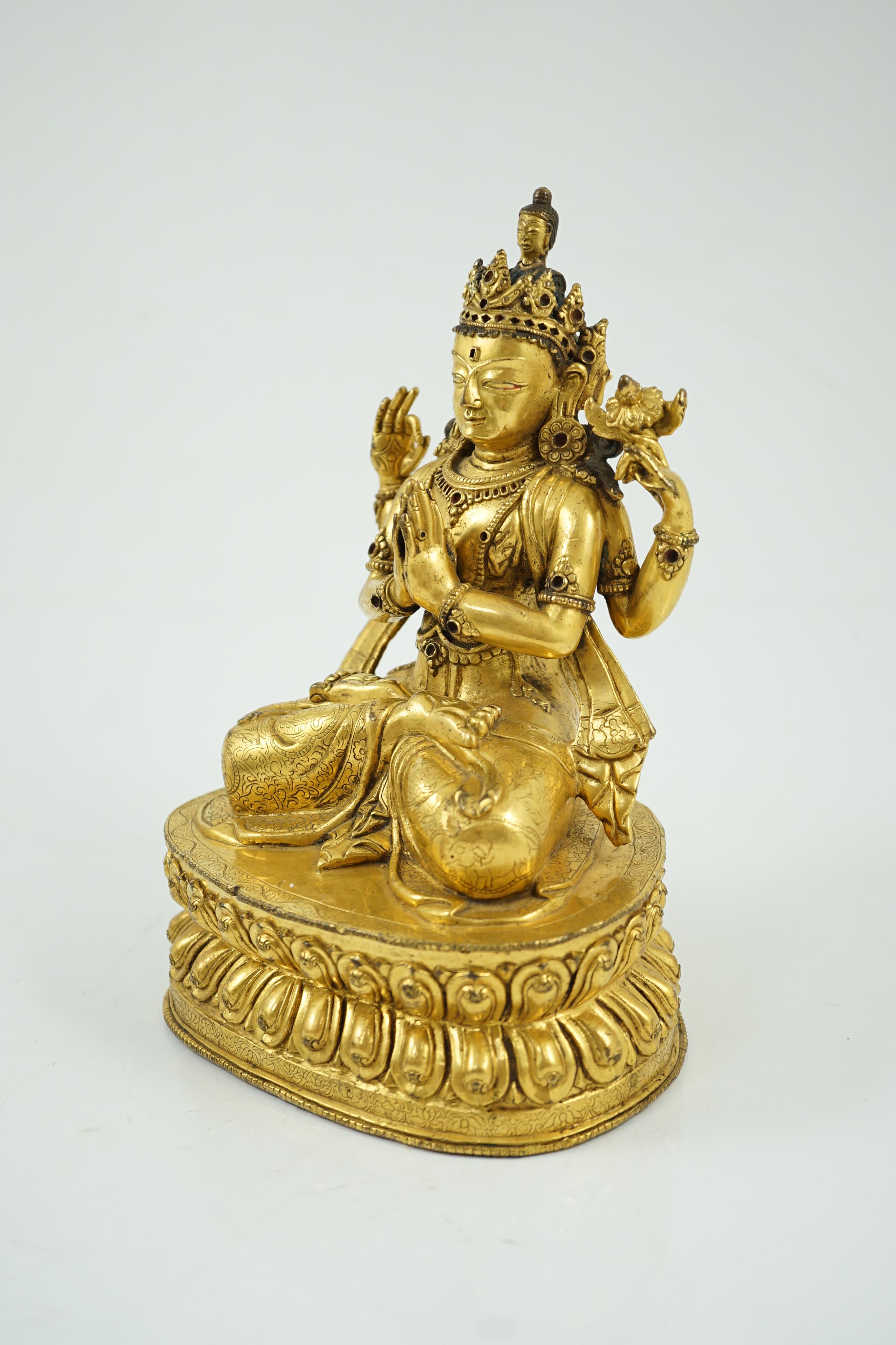 A Sino-Tibetan gilt bronze figure of Shadakshari Lokeshvara, possibly 18th century